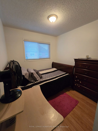 Bedroom A - Modern Room in Mississauga Townhome