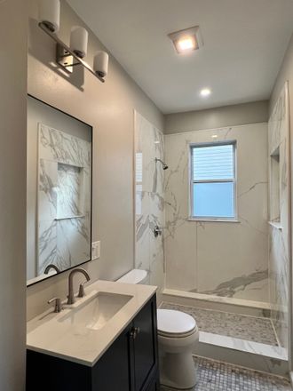 Updated Bathroom 1 - 3-4 Bedroom in heart of Somerville Apartments