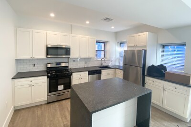 Kitchen - Amazing, renovated 4 bedroom right on Tremont Street in Mission Hill Apartments