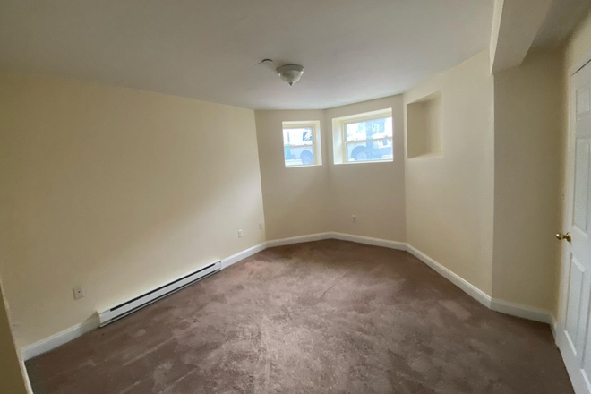 Visit hubrealtyproperties.com - Renovated one bedroom, basement level, on the T in Mission Hill, near HMS Apartments