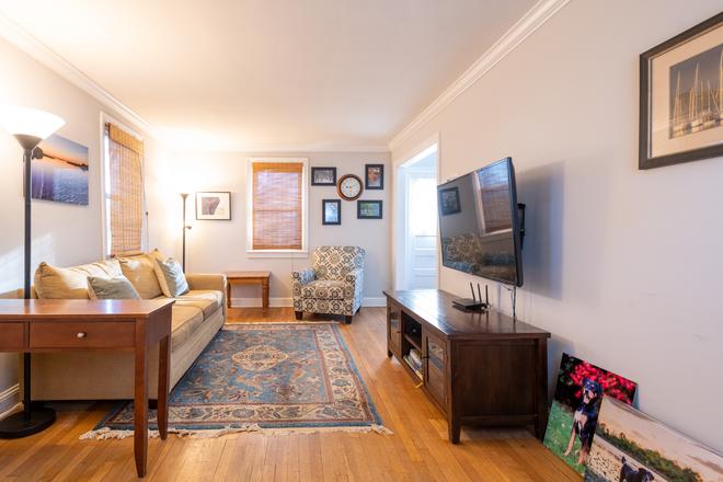 Main floor living room - Comfortable and updated home in north College Park, large private bedroom