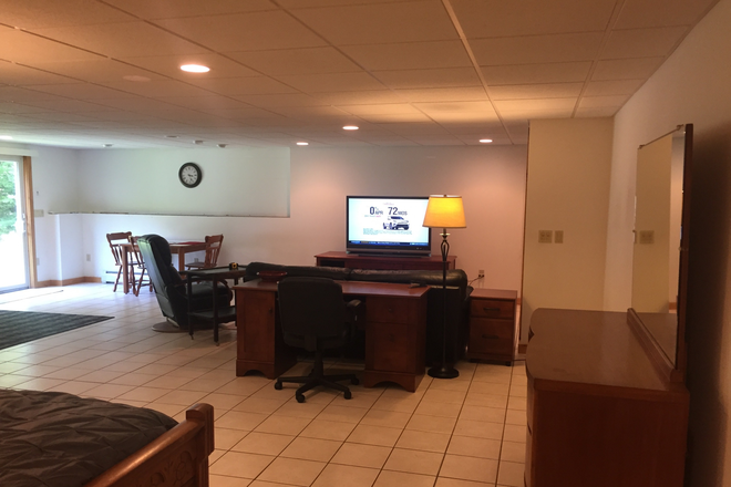 living room /dining room - Fully Furnished Studio Apartment