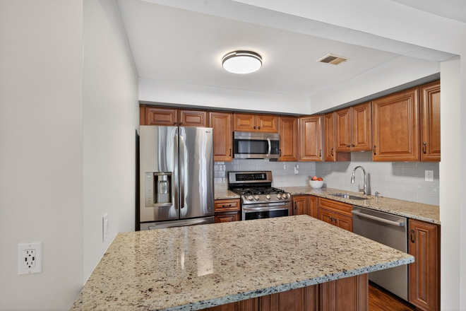 Updated kitchen with an island - 2BR condo-Commonwealth Ct-Princeton