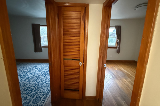 Hallway looking at both bedrooms - Waterfront Apartment