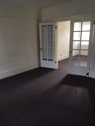 Lookin g from the living room to the bedroom - One Bedroom Apartment / Super Convenient Location