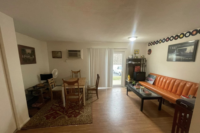 Dining area attached to kitchen, patio out back - Rolling Green Apartments, townhouse style