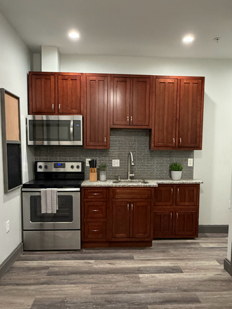 Kitchen - Fully Furnished Studio Available One Block from Peabody Shuttle Stop Apartments