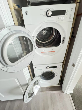 Laundry - Luxury master Bedroom with Private Bathroom in South Arlington Apartments