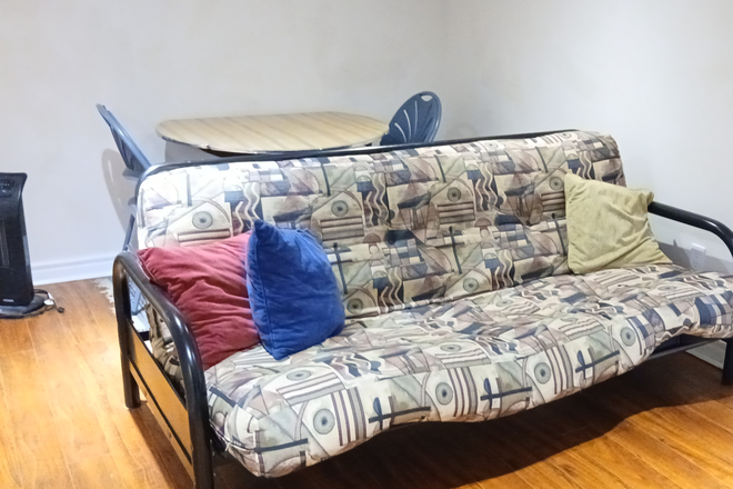 Living Area with table and couch - Only $850 – Fully Furnished Student Oasis (Main St Subway/GO) All utilities/bell fibe wifi included Apartments