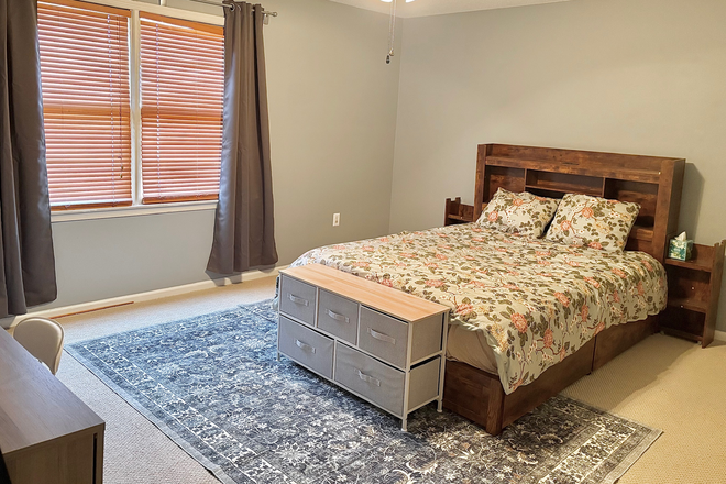 Furnished primary bedroom - Furnished room in shared condo for female-Carver Place-Lawrenceville