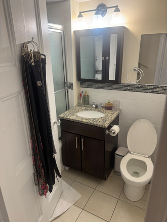 Bathroom - Shower and Tub, Storage Closet - Spacious Sunlit Studio On The Boston Commons