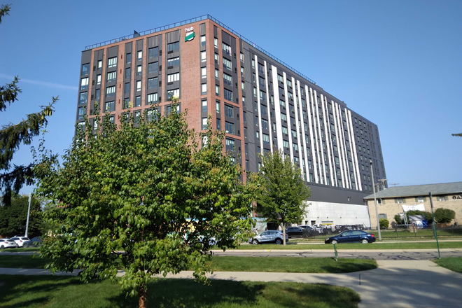 Outside of the HUB building - HUB on Campus Apartments