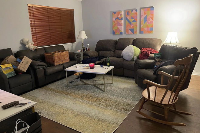 Living room with furniture - Lionsgate Dr Condo