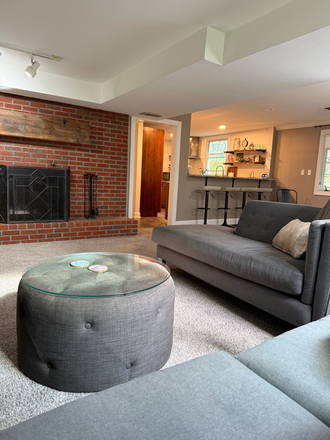 Living area and fireplace - Furnished guest suite-Vernon Lane-Yardley. Large studio near the bucolic Delaware canal tow path