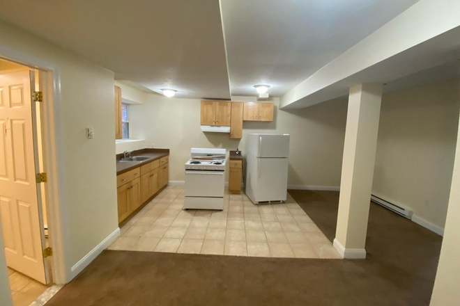 Visit hubrealtyproperties.com - Large one bedroom, basement level, on the T in Mission Hill Apartments