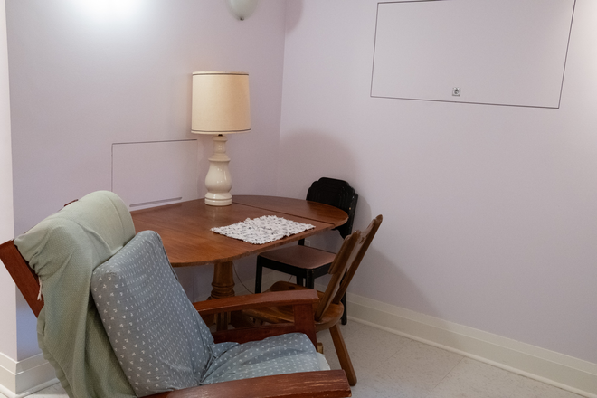 Dining table, chairs, glider rocker - Lovely private, quiet furnished all-inclusive suite with private laundry in historic Seaton Village Apartments