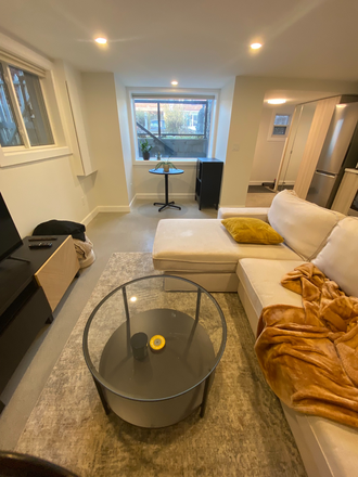 Living-dining area w/ heated floors througout - Newly renovated 2bdrm w/ heated floors, dishwasher, laundry private walkout, yard