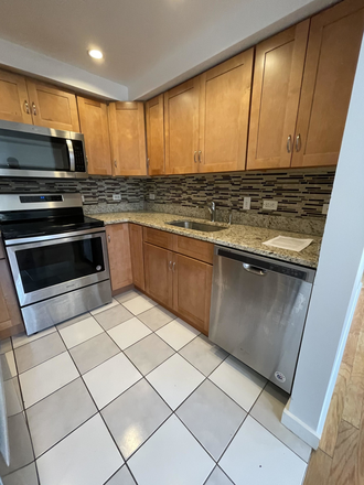 Call call or text Arezou at 617-584-7817 - Renovated 2 bed on the 4th floor of elevator building! very close to campus! w/d in each floor! Condo