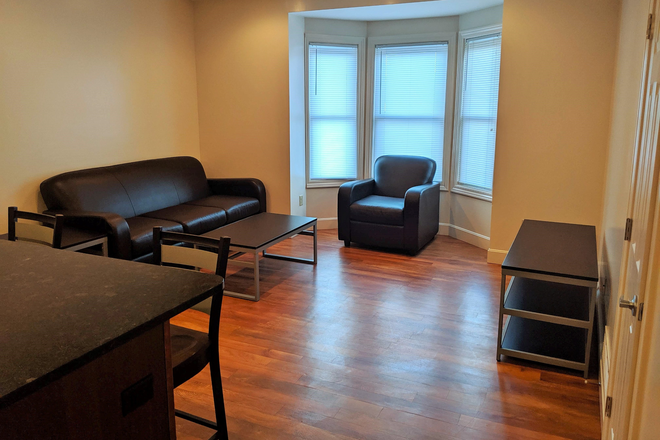 Living Room - 21.5 E High Street #202 Apartments