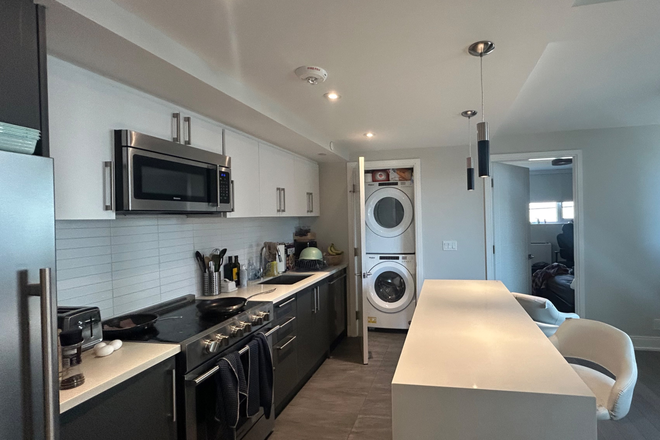 Kitchen - 1 furnished bedroom in a  2-bedroom, 2-bathroom with Laundry machines and kitchen just off Bloor.