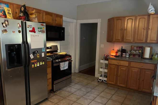 Kitchen (oven & fridge) - Summer Sublet in Mission Hill! Triplex