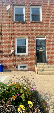 Outside - Furnished Townhouse with Hardwood Floors, Washer-Dryer, Central AC, Balcony & Off-Street Parking