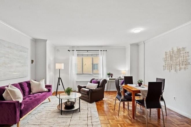Family Room - Spacious 1BR Condo in Quiet Neighborhood Close to Metro