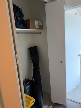 Corridor with two large storage spaces (great for instruments, winter apparel, luggage and other things that might not fit or be essential - Unit NE3