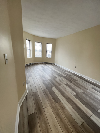 Visit hubrealtyproperties.com - Brilliant 3 bedroom with living room, lots of light, handy to the T and campus Apartments