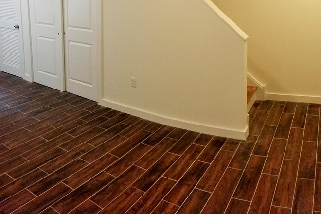 Living space - 1705 W. Norris, Unit B - (Group of 4) 4 bed, 4 bath Modern Apartment on Campus!  $575 p