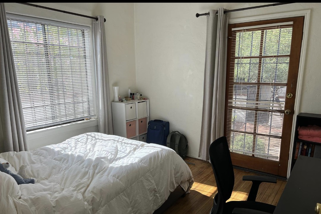 Bedroom (note: current decor is slightly different than pictured will be removed upon move out) - Room Available in Cute House Walking Distance From Campus