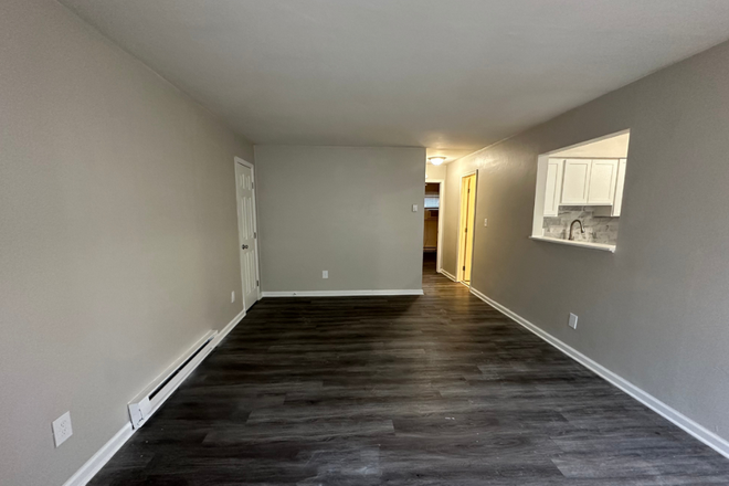 Living Room - ODUrent Offers 9511 First View St! Apartments