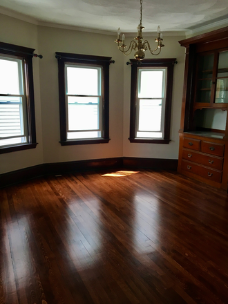 dinning room - 2 Bd Apt, 10 min walk to Tufts, front & back porches, ample storage, laundry, & parking
