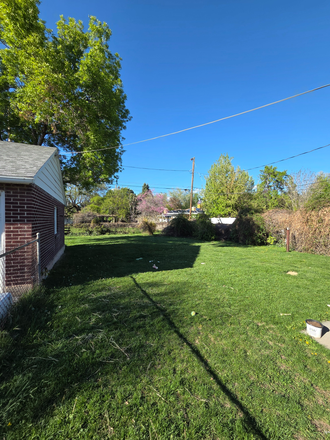 Backyard - URGENT: Two roommates needed! Spacious 3-bedroom home in Millcreek with move-in June 1!