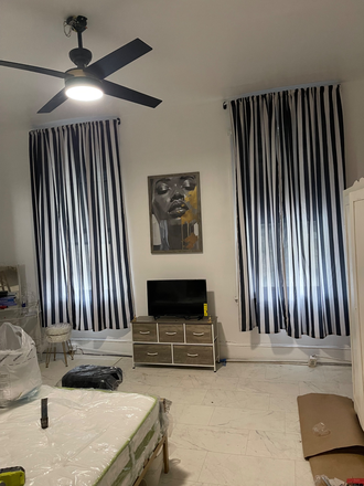 Large front bedroom fully furnished with desk and full size bed an a vanity with extra dresser and closet space - Della blue