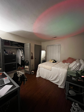 Bedroom is fairly spacious, the door by the end of the bed does not open. I believe it is for the boiler tank. - Terrace View Apartments