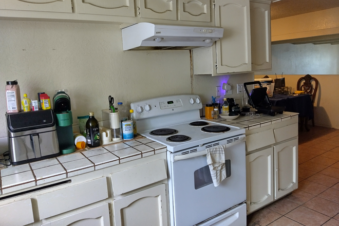 kitchen (second floor)left - Room with half bath and shared full bath Townhome