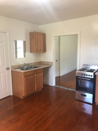 Cabinet and fridge not pictured. They are to the right of the stove. - Studio Apartment All utilities included