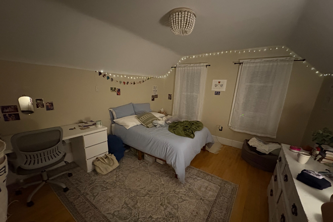 Bedroom that is available for rent (has overhead lighting just not turn on in picture). Furniture in pic is included! - Large Furnished Room Sublet for Spring 2026 Duplex