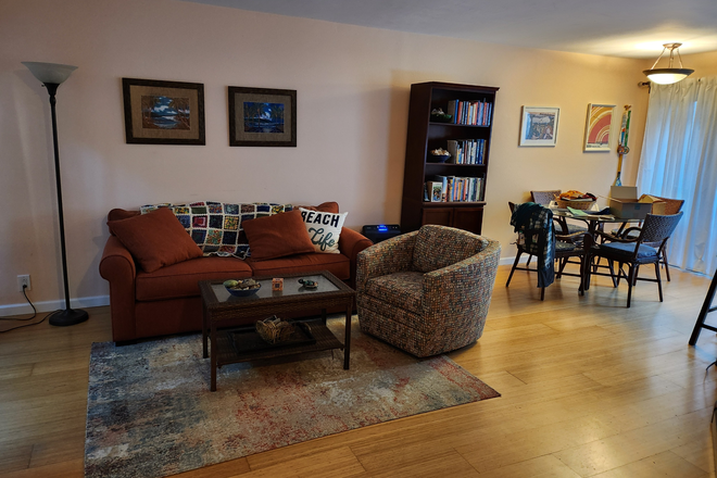 Living Room and Dining area - Two bedrooms, two and 1/2 baths close to campus