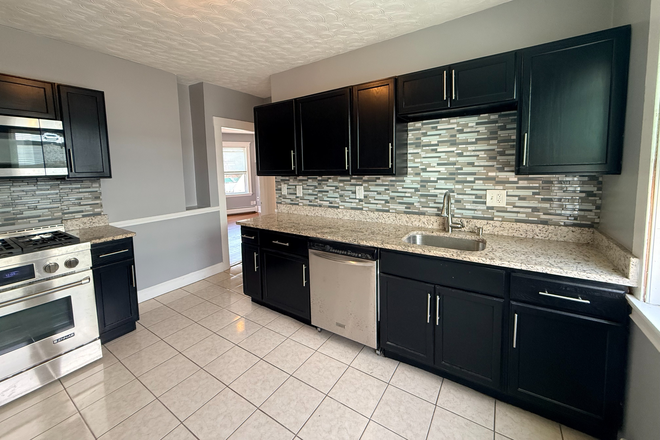 Kitchen - Renovated 3 Bedroom Apartment with classic charm! 8 minutes walk to Fields Corner-Red Line