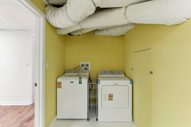 Laundry room- lower level - Decatur 5 Bedroom Midcentury Modern- Renovated with Vintage touches House