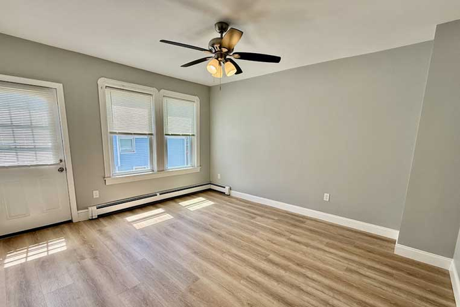 Living room - Beautiful unit, just redone 6 miles from campus new everything (not actually in Blackstone) Apartments