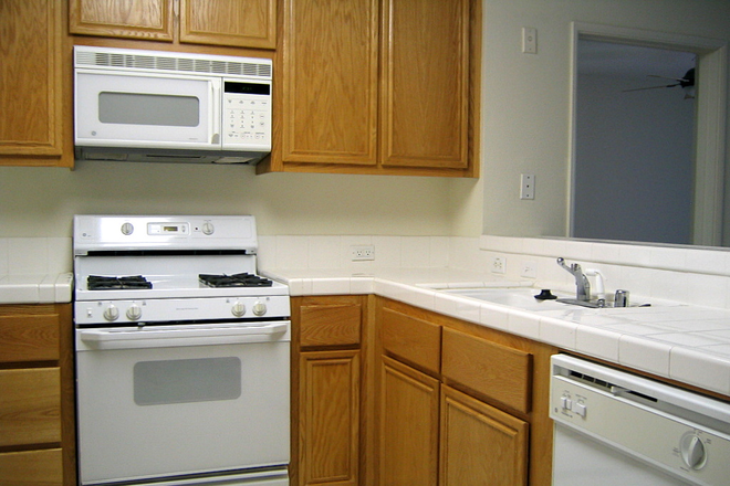 kitchen - Luxurious 2 Bedroom Condo with Modern Amenities**