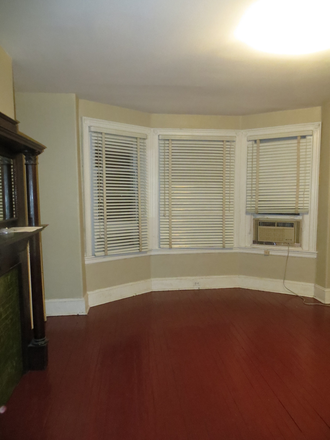 2nd floor front room with 3 windows overlooking street and window AC unit - 615 South 42 Street.  Convenient location USP, Penn and Drexel and public transportation. Townhome