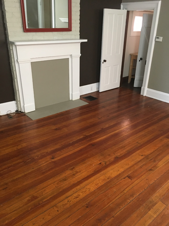 Living Room - Large house close to campus with large light filled rooms. Heat and air. Wifi included.