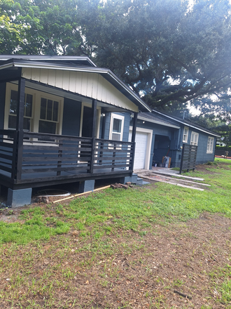 Front porch/parking area - Hourglass District 1/1 Available now Triplex