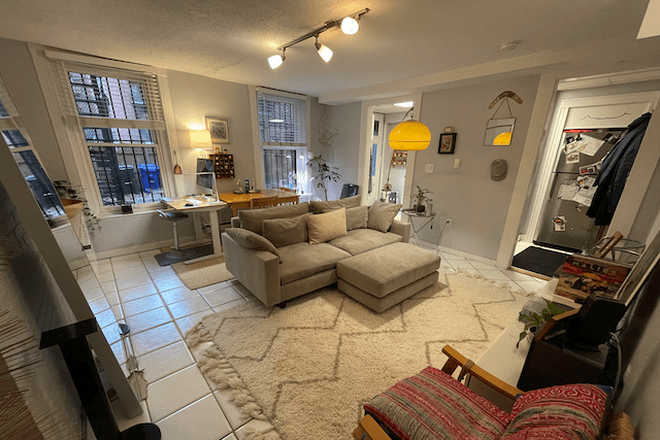 living - STUNNING 1 BED/1 BATH AVAILABLE 9/1/25! HEAT AND HOT WATER INCLUDED!! Apartments