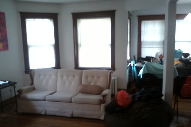 Visit hubrealtyproperties.com - Handy 5 bedroom 2 bathroom with dishwasher, deck, on green line T Apartments