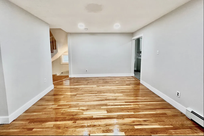 Living room - 2 BHK available 5 min walks to brand new MBTA green line at union square Apartments